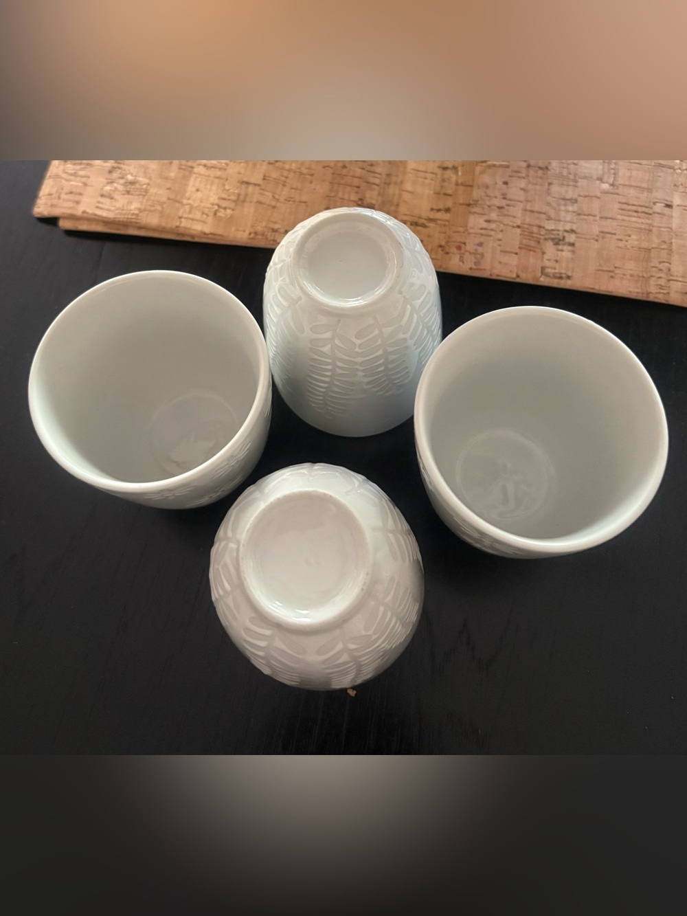 Ceramic white tea cups with flower and leaf embossed motifs BNWOB